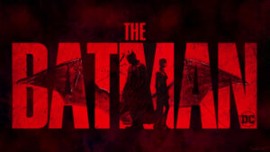 "New look at Robert Pattinson's return in The Batman 2, Batman standing in the dark streets of Gotham"